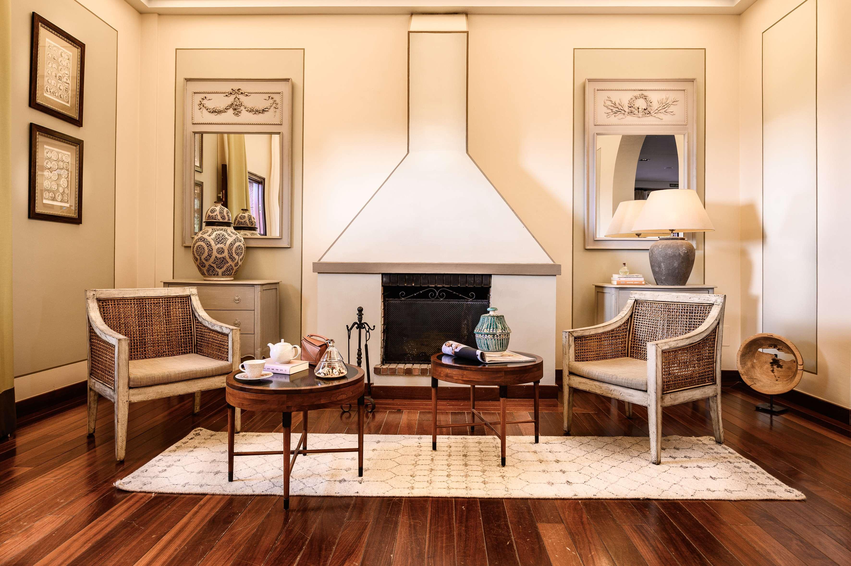 Hotel Hacienda Del Conde Melia Collection Golf & Spa - Adults Only Буенавіста-дель-Норте Екстер'єр фото A living room with a fireplace
